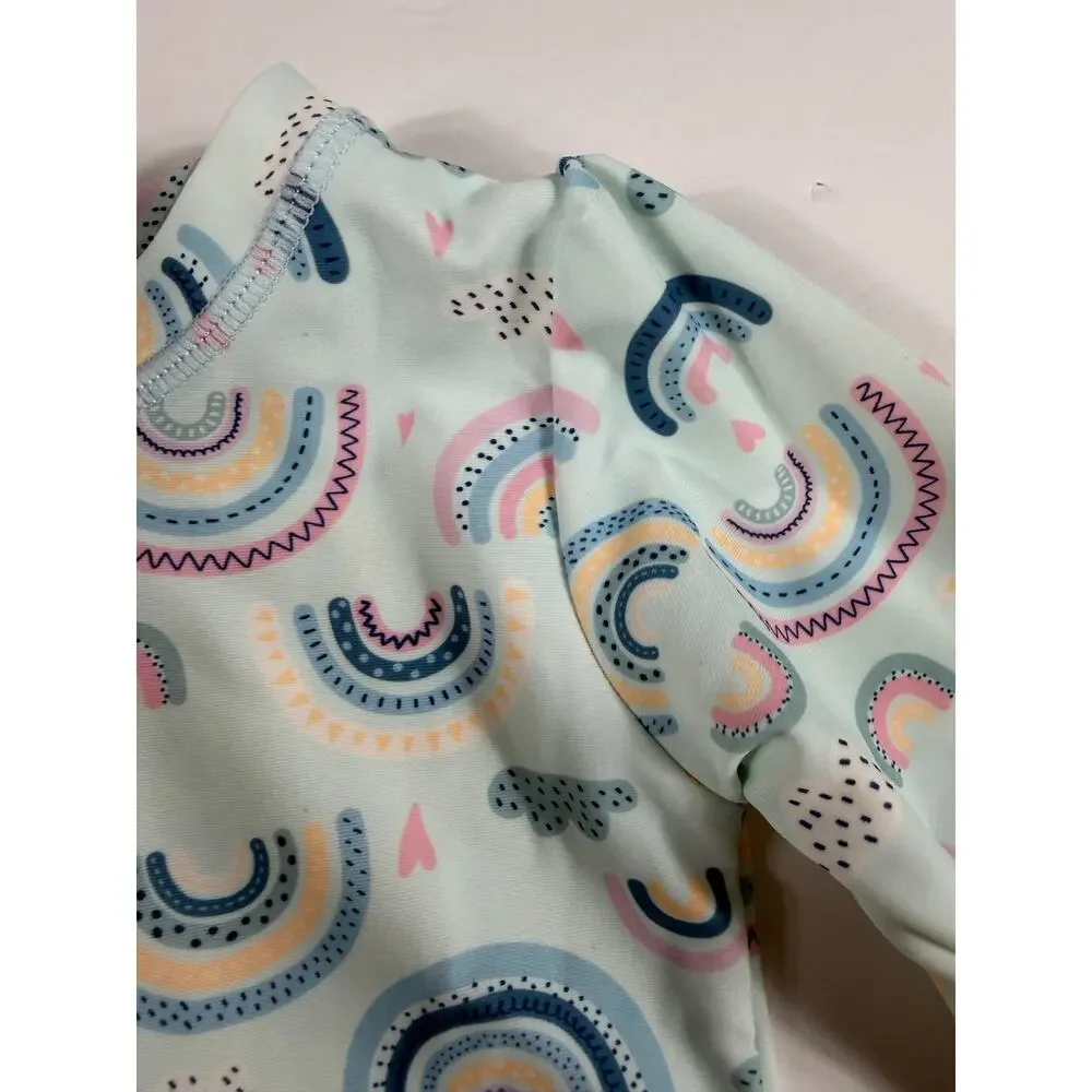 RuffleButts Rainbow Print Long Sleeve One-Piece Rash Guard Swimsuit 12–18 months